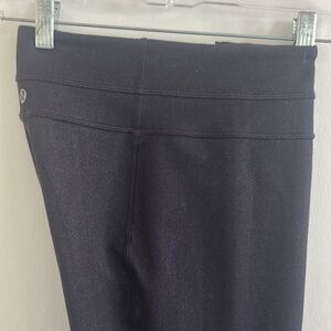 Lululemon VGUC purple leggings with inside waist pocket, longer in length.
